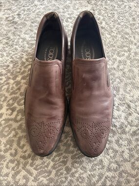 Tod's Dark Brown Leather Slip-On Loafers with Perforated Toe Motif